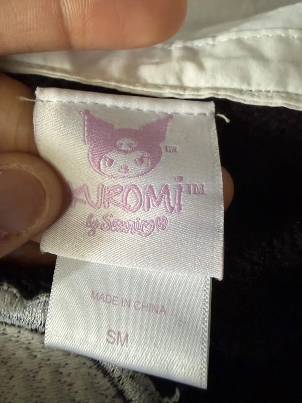 Sanrio black sweater cardigan with pink and purple accents - Picture 3 of 3
